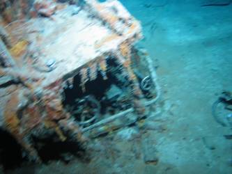 S1 stbd forward 4-inch HA Gun and mount inverted on seabed